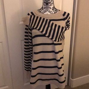 Beige and navy striped sweater.